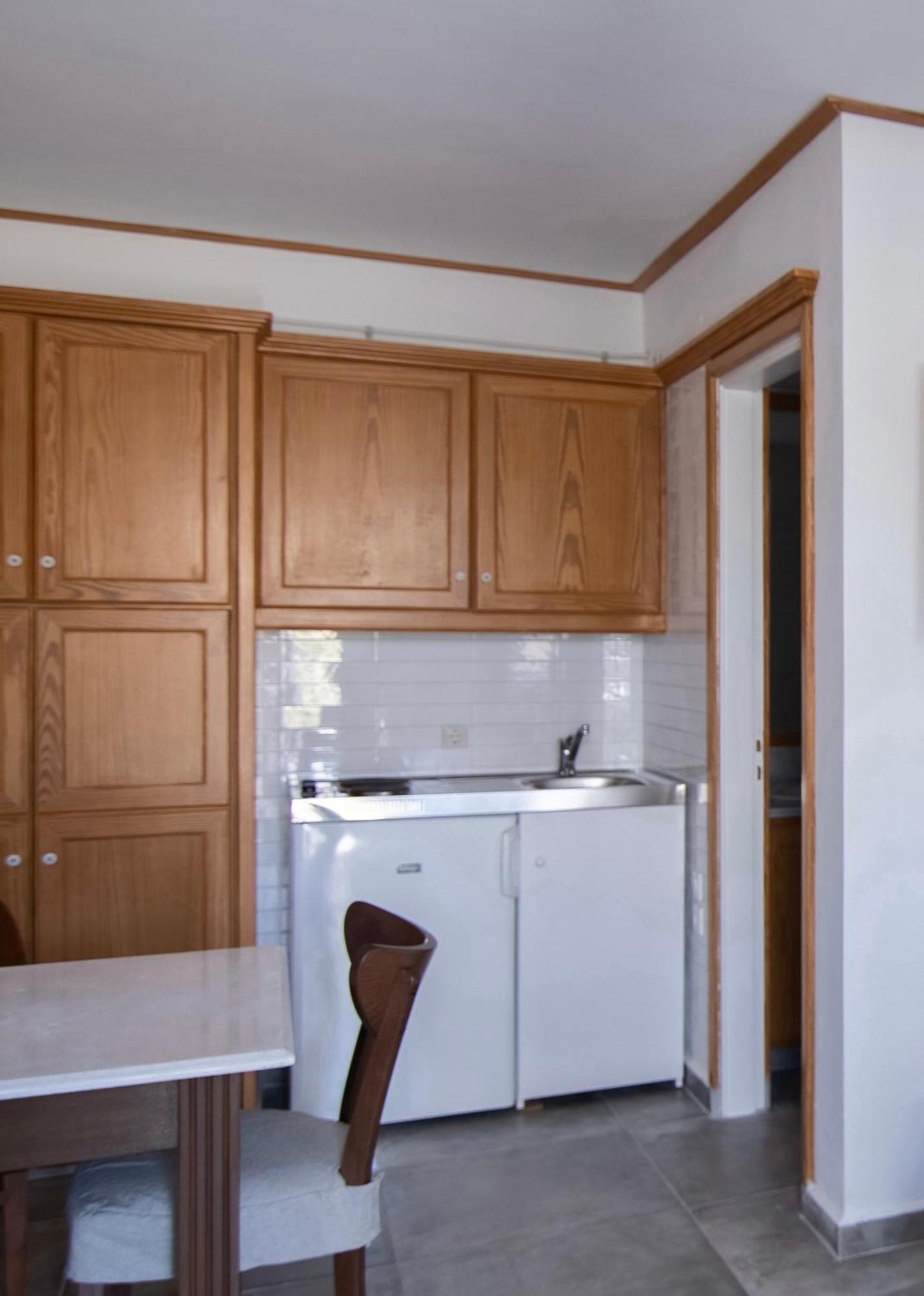 Lotos Beach Home Kini Buitenkant foto